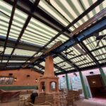 Indoor restaurant patio with retractable awning