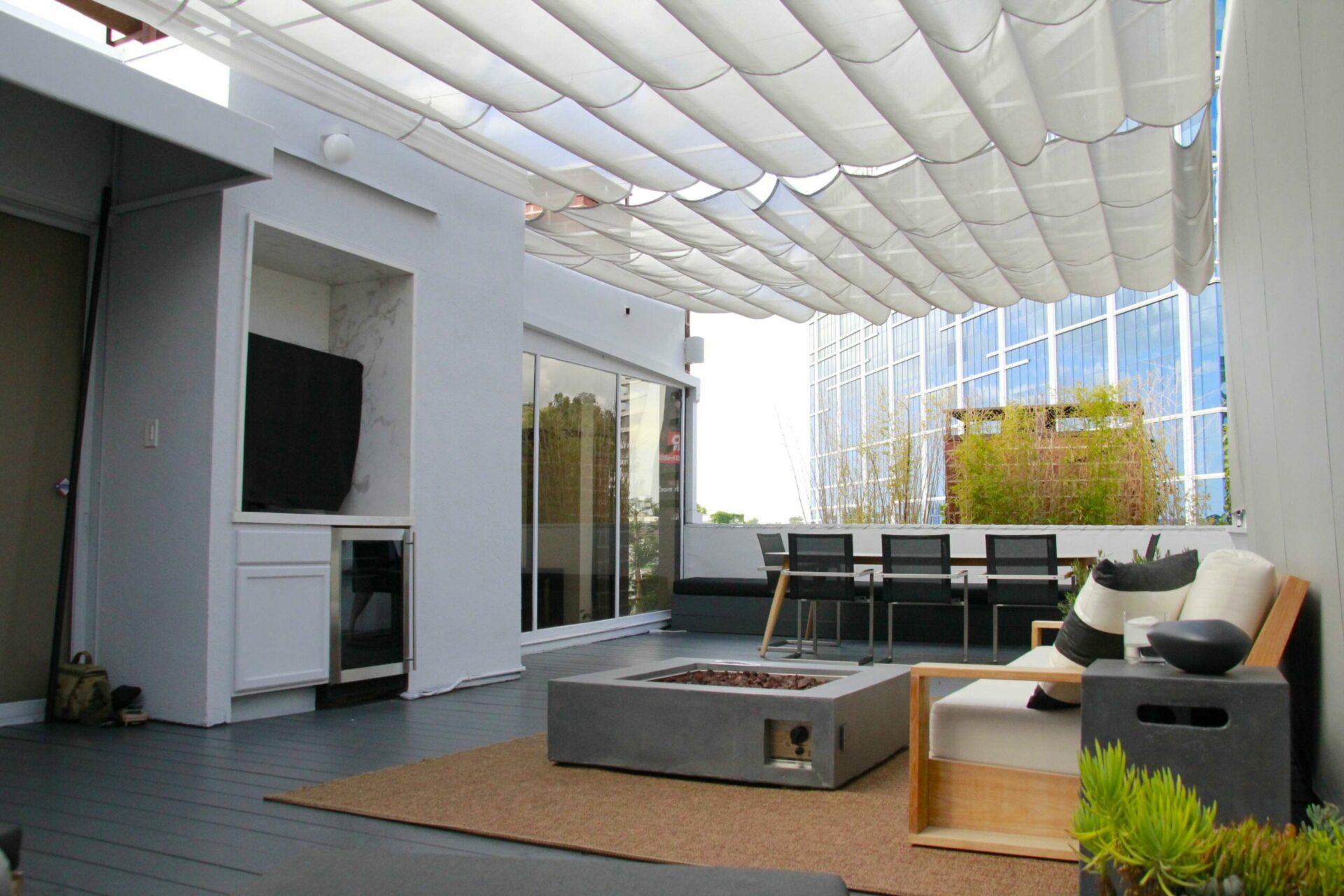 Slide on wire awnings over a backyard patio