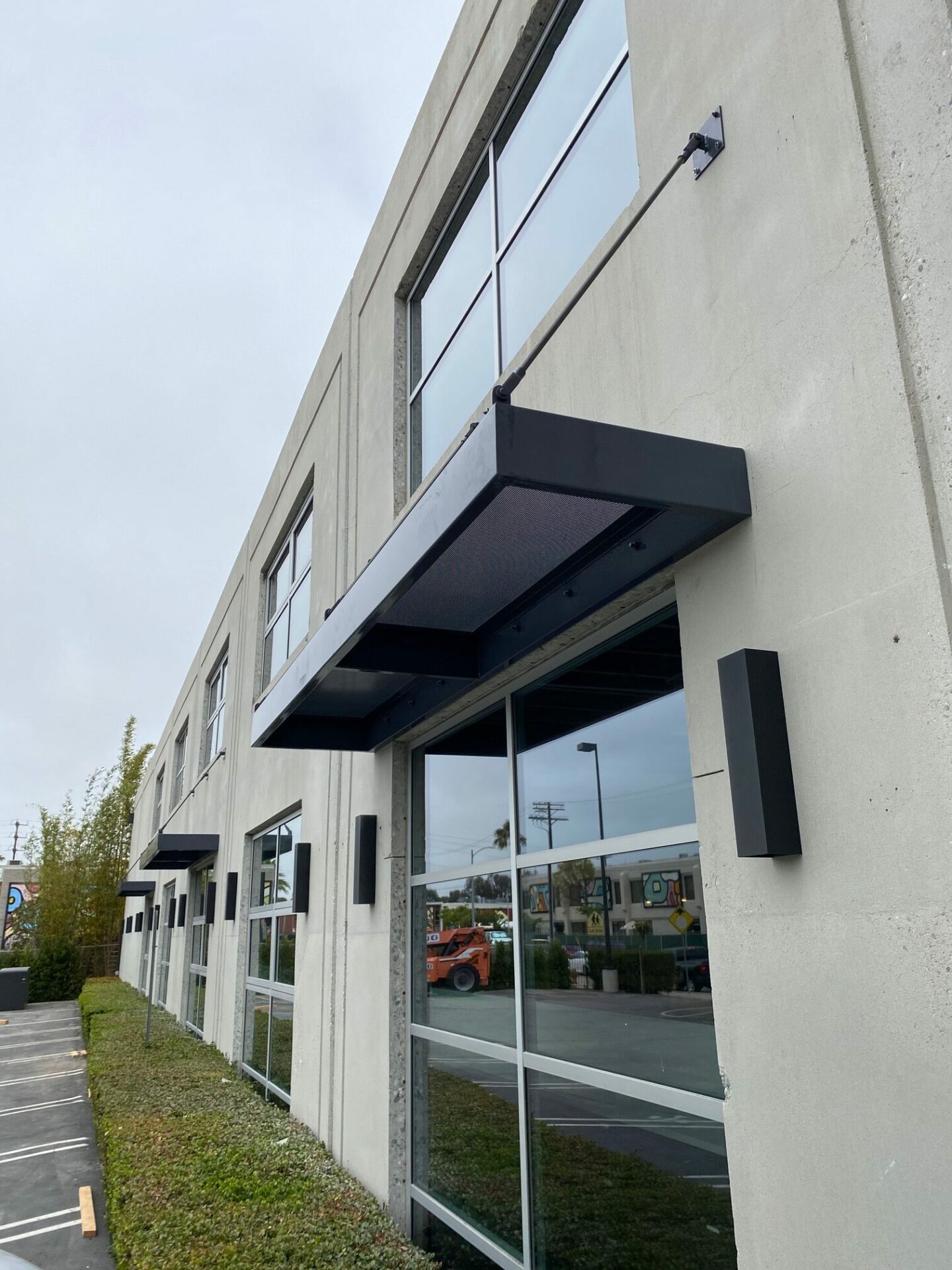 Commercial building with metal canopy